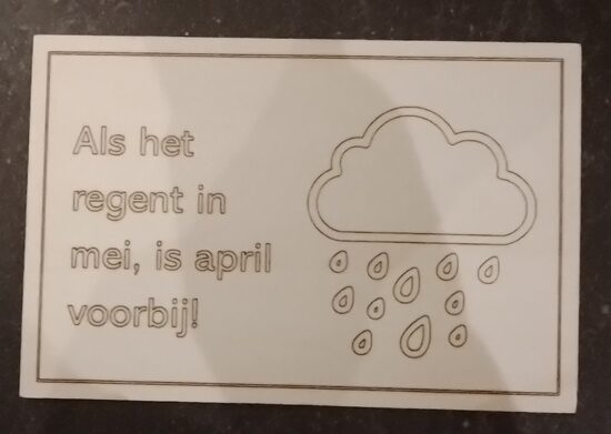 Spreukbordje "als het regent in mei..."